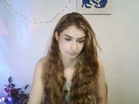 Hey, I’m Nina – blonde hair, green eyes, and tattoos that love to tell their own stories. My taste in music? Somewhere between Doja Cat’s groove and Rammstein’s fire ? I adore singing, dancing, and just vibing with the right energy. Sometimes I’m your sweet daydream, sometimes your wild rock chick – depends on which song is playing ?